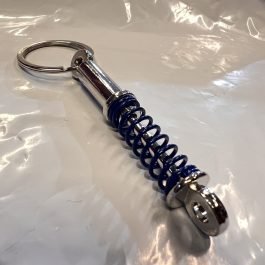 Shock absorber keychain blue