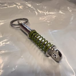 Shcokabsorber keychain green